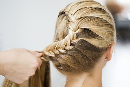 Avoid Ponytails and tight Hairstyles