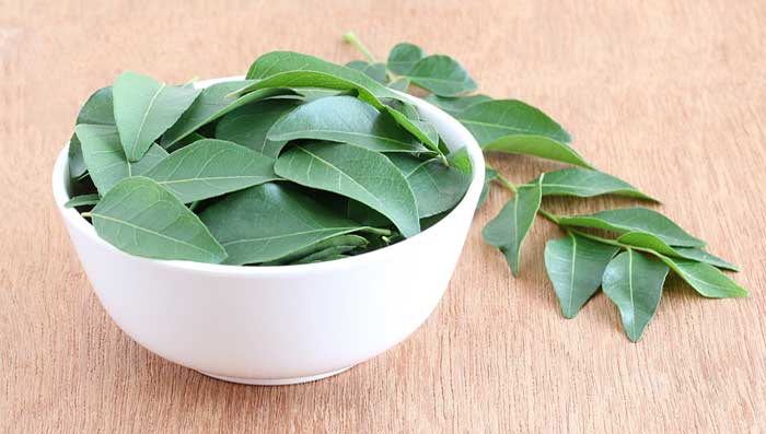 Curry leaves and coconut hair mask