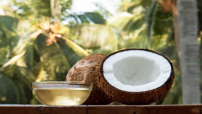 Home Remedies Using Coconut Oil For Dandruff